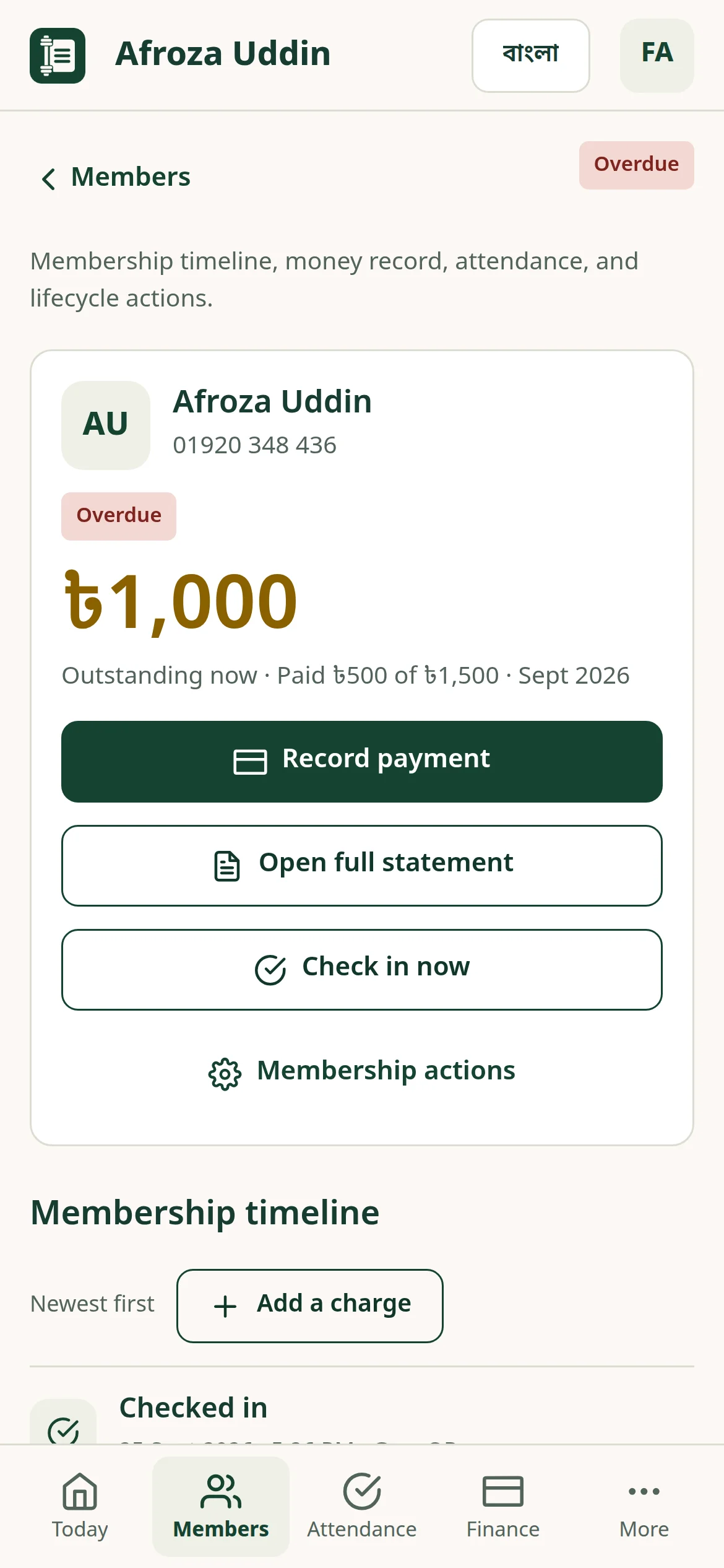 A member’s record in Liftuno on a phone, showing the outstanding balance and a Record payment button